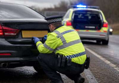 Police roadside check during DVLA number plate crackdown on illegal, cloned and ghost plates in the UK.